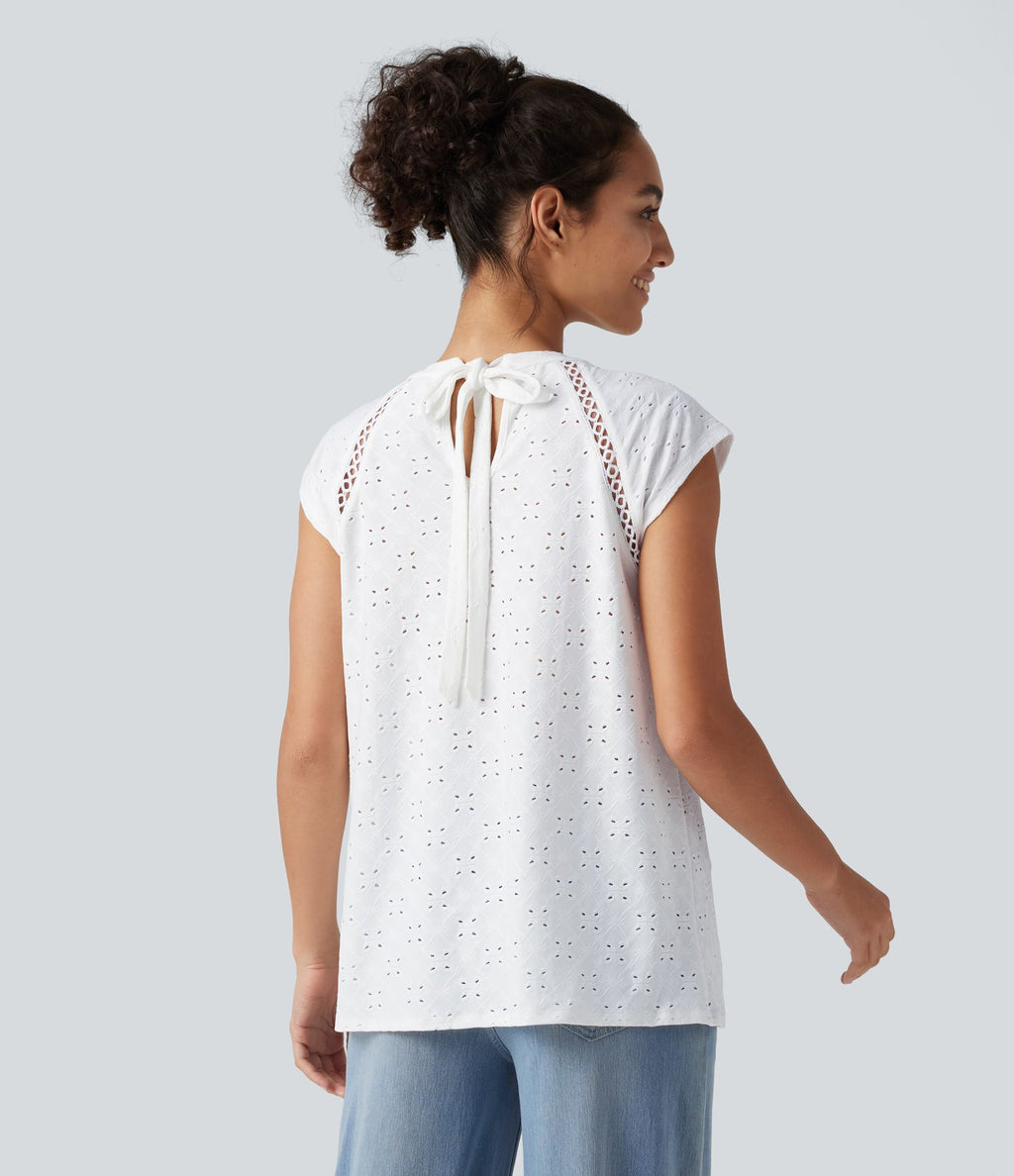 Blouse décontractée à col rond, mancherons, découpes et lien au dos