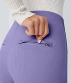 Pantalon tailleur skinny gainant taille haute à chevrons avec poches arrière zippées décoratives