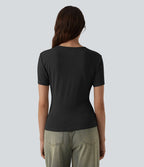 T-shirt col rond manches courtes avec boutons-pression