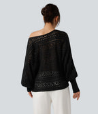 Pull ajouré col rond manches chauve-souris longues