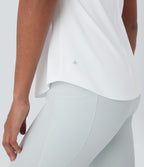Débardeur yoga dos nu col U avec bretelles croisées, ourlet arrondi et effet frais InstantCool, protection solaire UPF50+