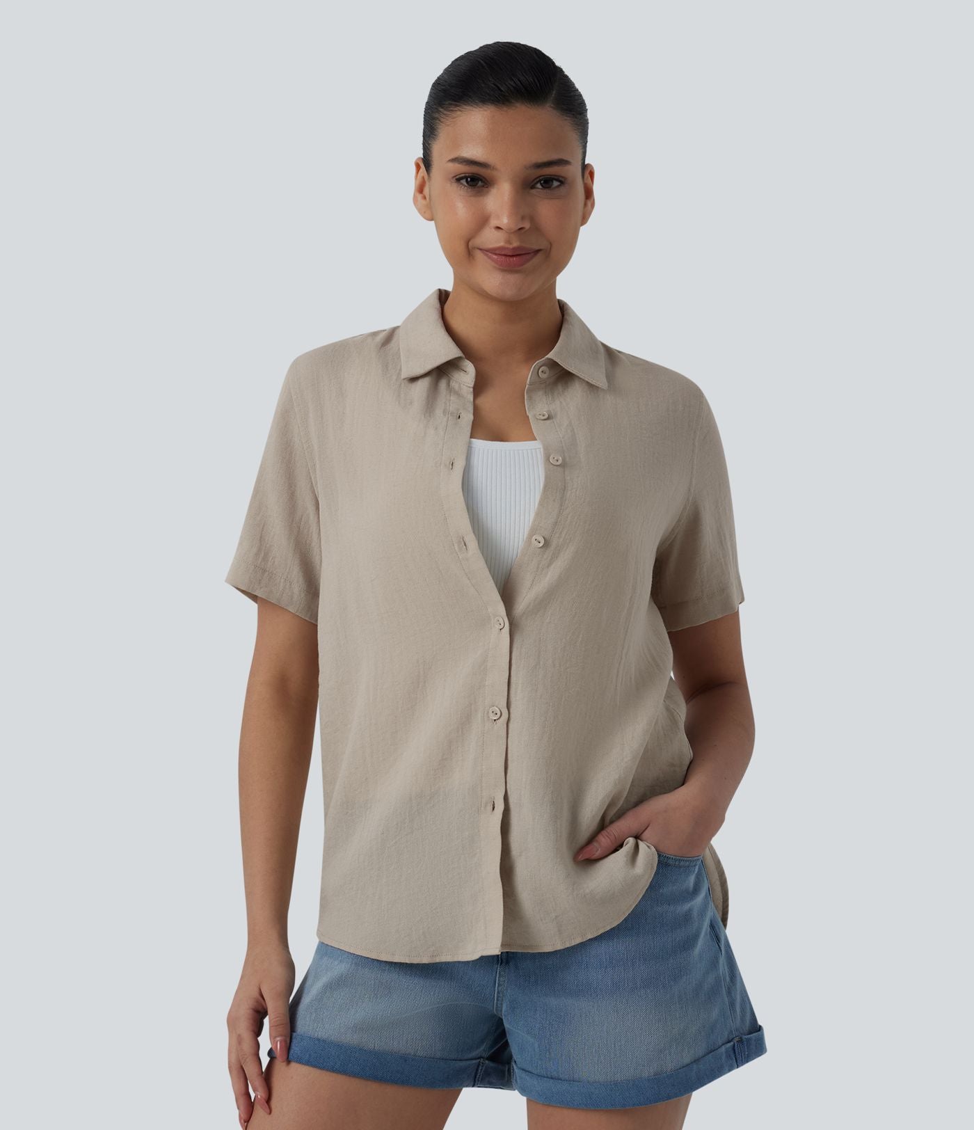 Chemise décontractée à manches courtes avec col et ourlet arrondi, aspect lin
