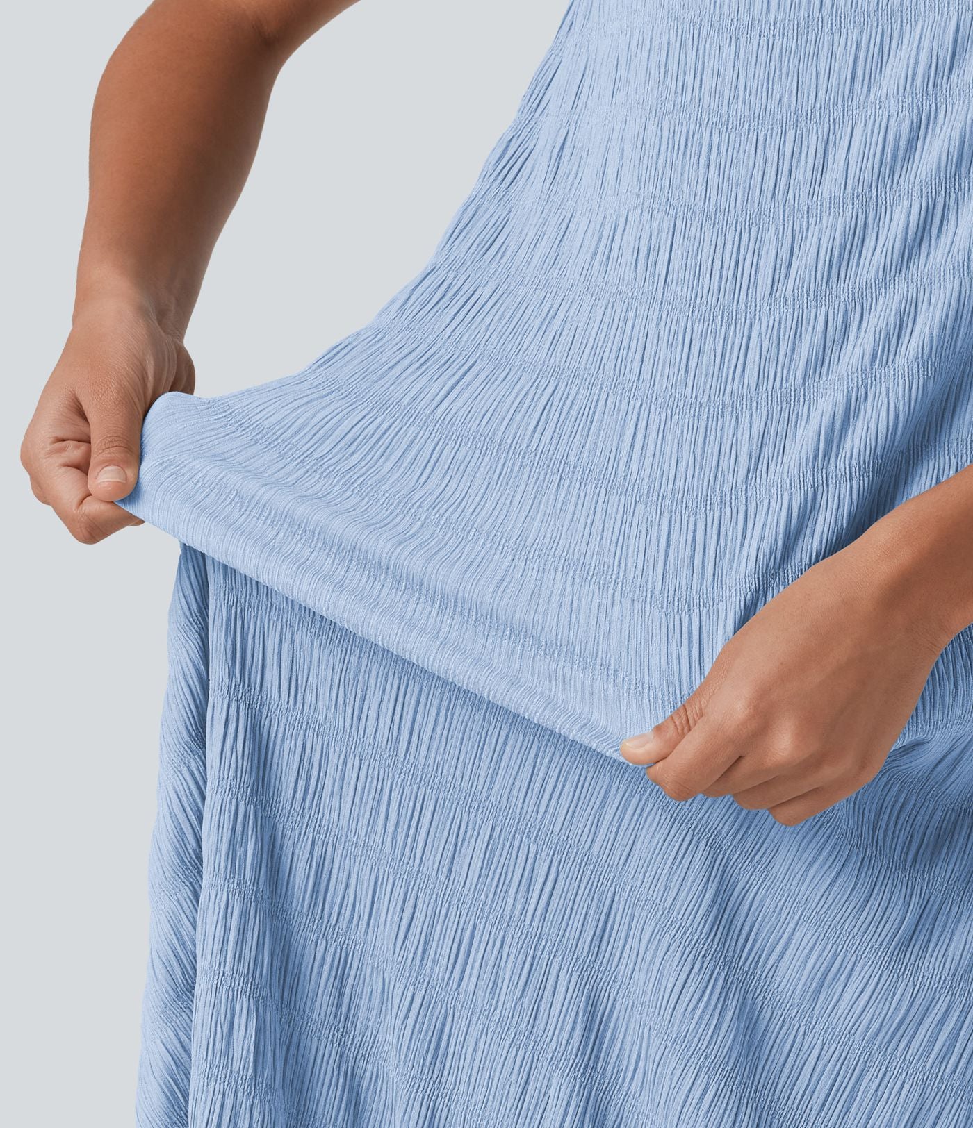 Robe midi sans manches à encolure arrondie avec coussinets amovibles et ourlet à volants