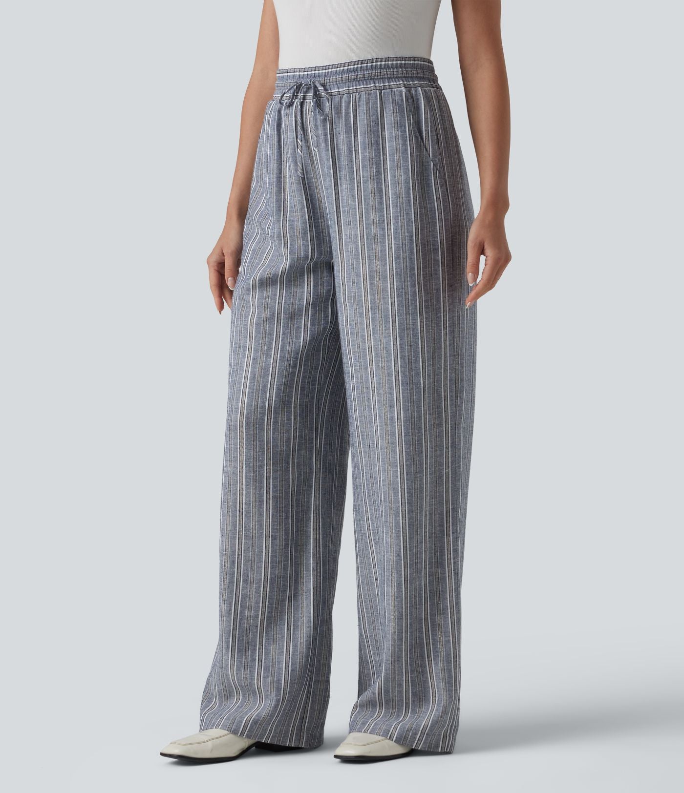 Pantalon tailleur large en lin rayé taille haute avec cordon de serrage et poches