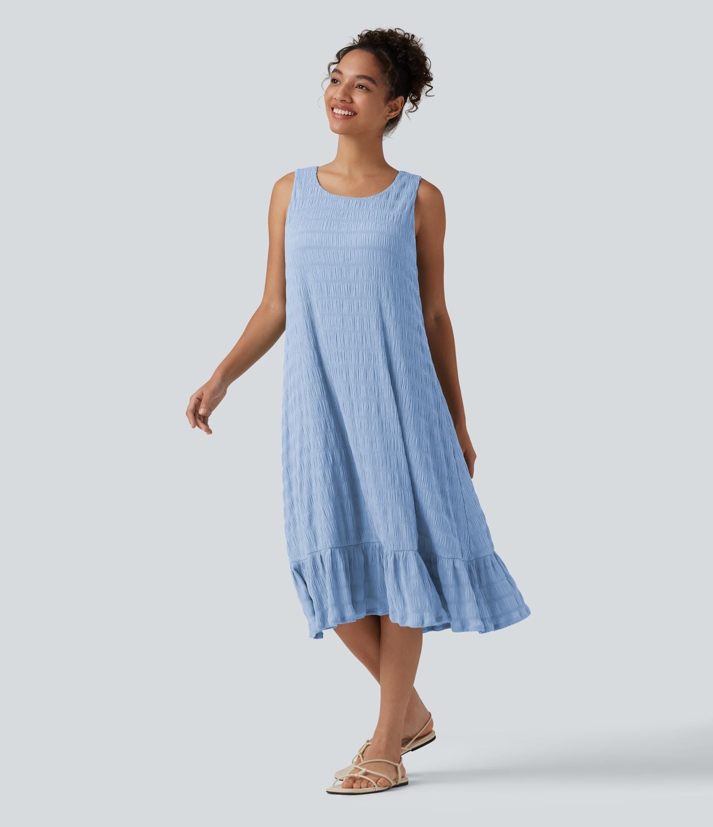 Robe midi sans manches à encolure arrondie avec coussinets amovibles et ourlet à volants