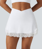 Jupe de golf mini 2-en-1 SoftlyZero™ Airy taille haute croisée à effet frais InstantCool avec ourlet en dentelle et poches, protection solaire UPF50+