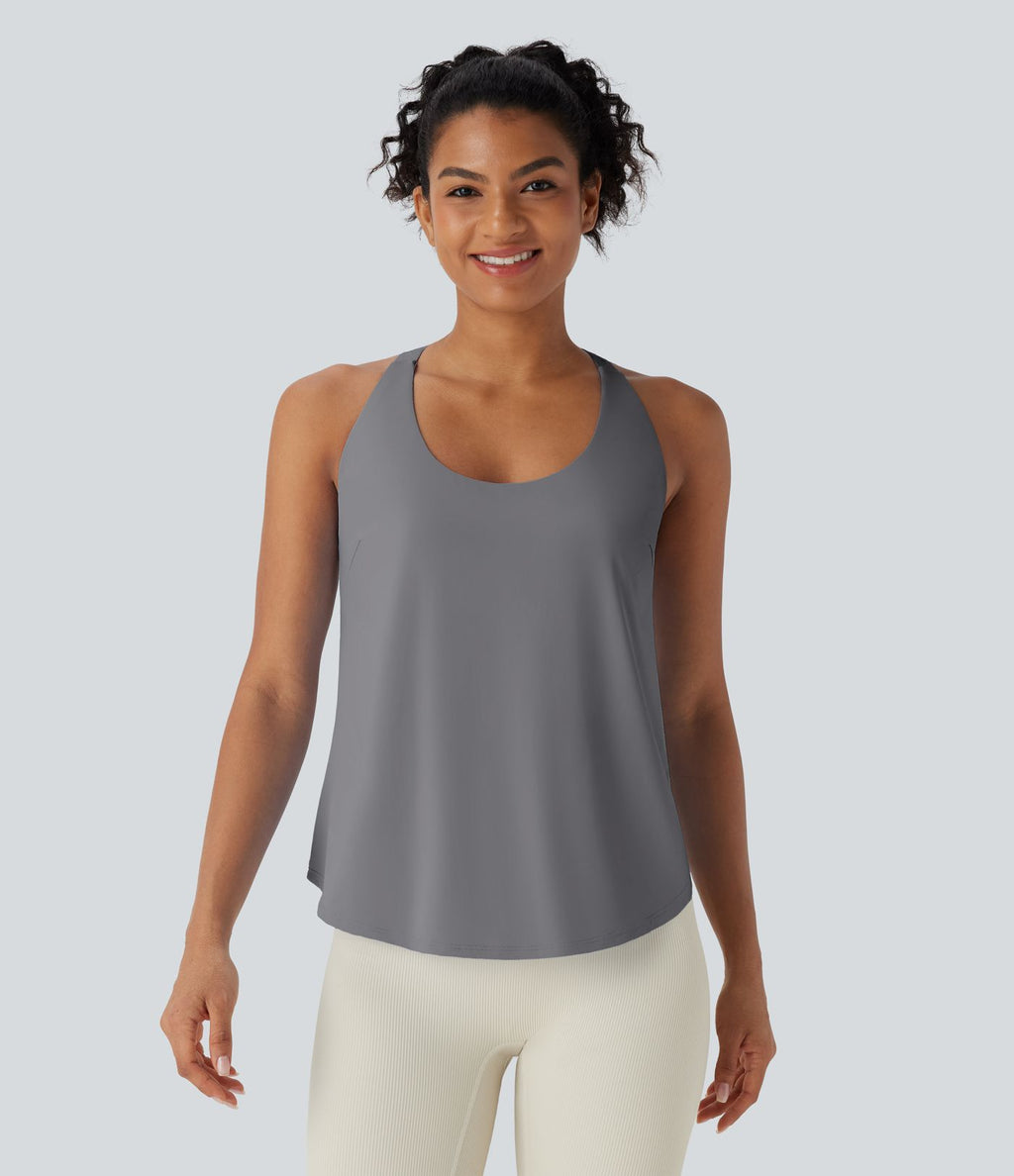 Débardeur yoga dos nu col U avec bretelles croisées, ourlet arrondi et effet frais InstantCool, protection solaire UPF50+