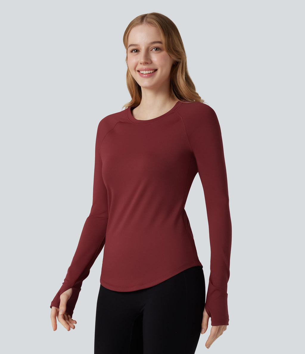 Top de sport col rond ourlet arrondi manches longues avec trous pouces et poche