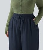 Pantalon grande taille large fluide taille haute avec cordon de serrage, poches et aspect lin