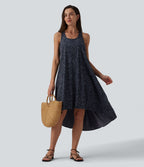 Robe mi-longue fluide station balnéaire dos nageur sans manches asymétrique imprimé léopard avec poches