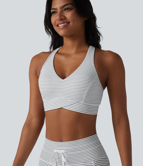 Brassière de sport col V dos nageur maintien moyen à rayures