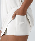 Robe de golf mini SoftlyZero™ Airy 2-en-1 à effet frais InstantCool color block avec poche pour tee de golf
