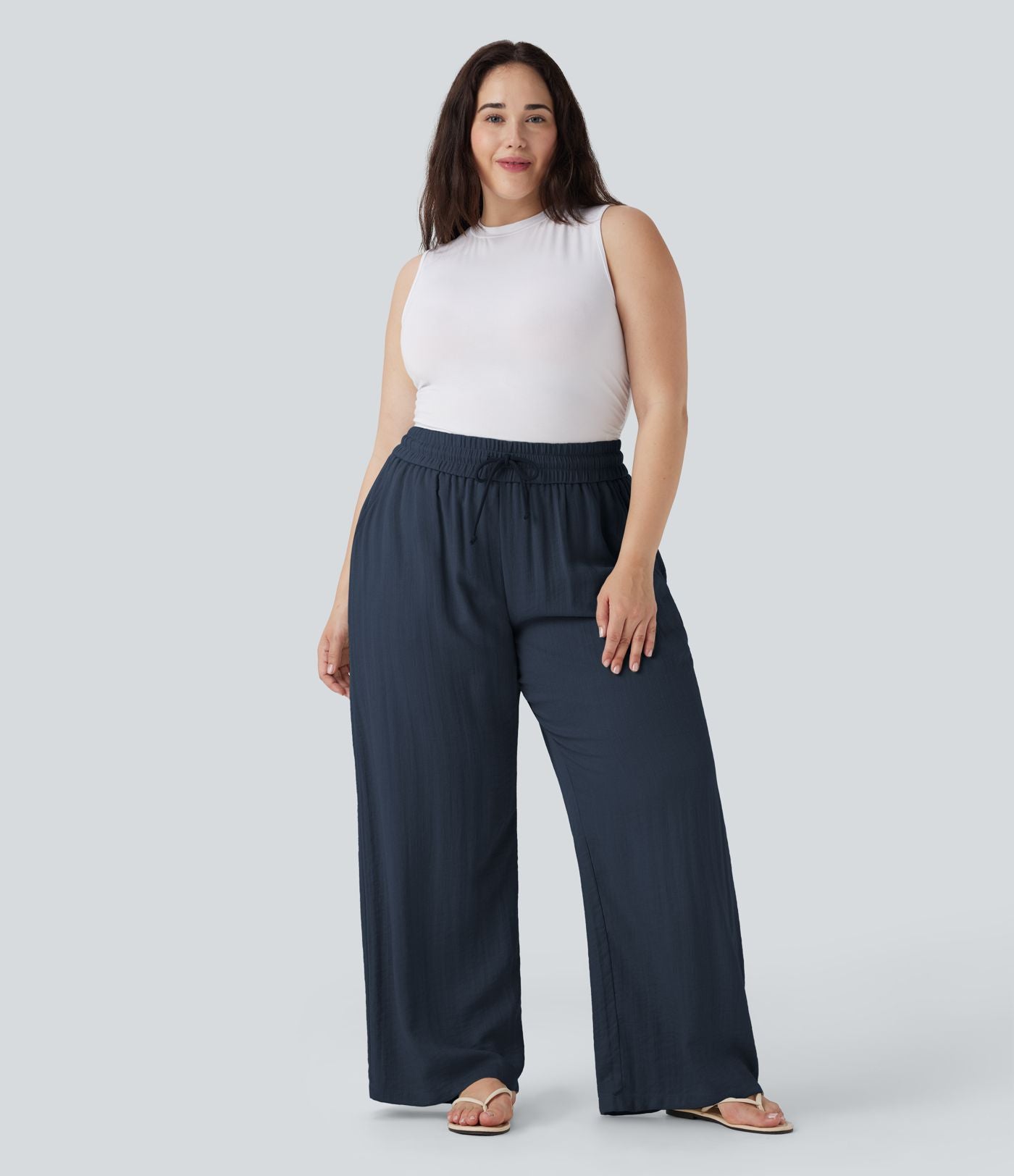 Pantalon décontracté grande taille large fluide taille haute effet lin avec cordon de serrage et poches
