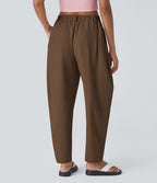 Pantalon tailleur ample, taille moyenne, coupe barrel, à poches