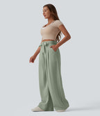 Pantalon casual ample taille haute aspect lin avec ceinture et poches
