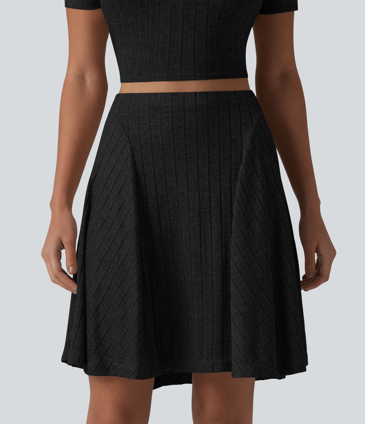 Jupe mini évasée casual 2 en 1 en maille côtelée taille haute avec poches