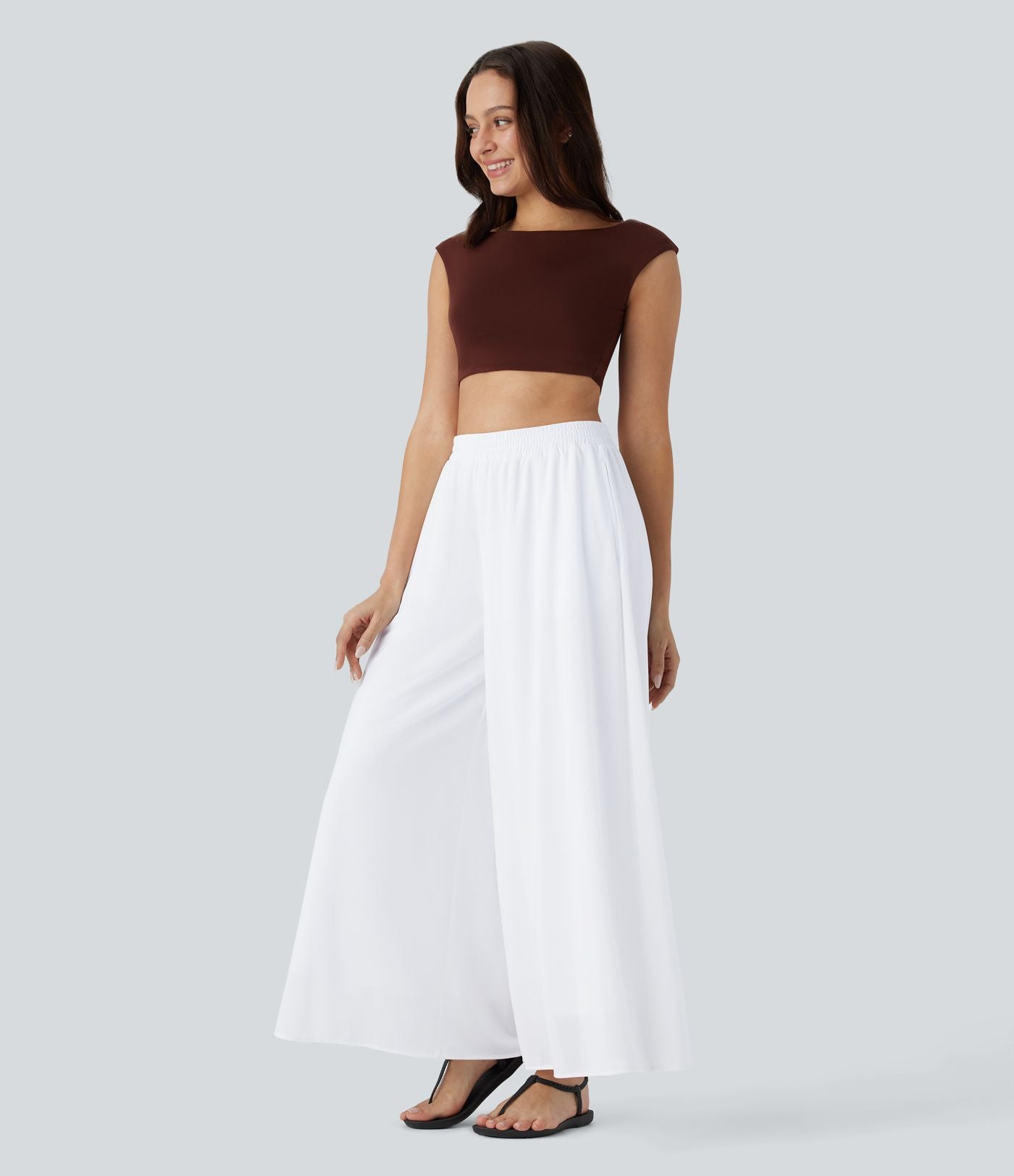 Pantalon fluide et ample avec superposition en mesh, poches latérales et taille haute