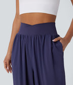 Pantalon de yoga croisé taille haute à séchage rapide Breezeful™ avec poches latérales