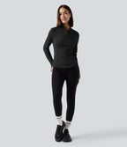 Haut de sport yoga polaire col montant demi-zip à manches longues avec passants pouces