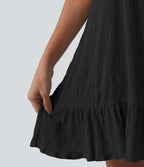 Robe courte décontractée sans manches à col rond, soutien-gorge intégré et ourlet à volants