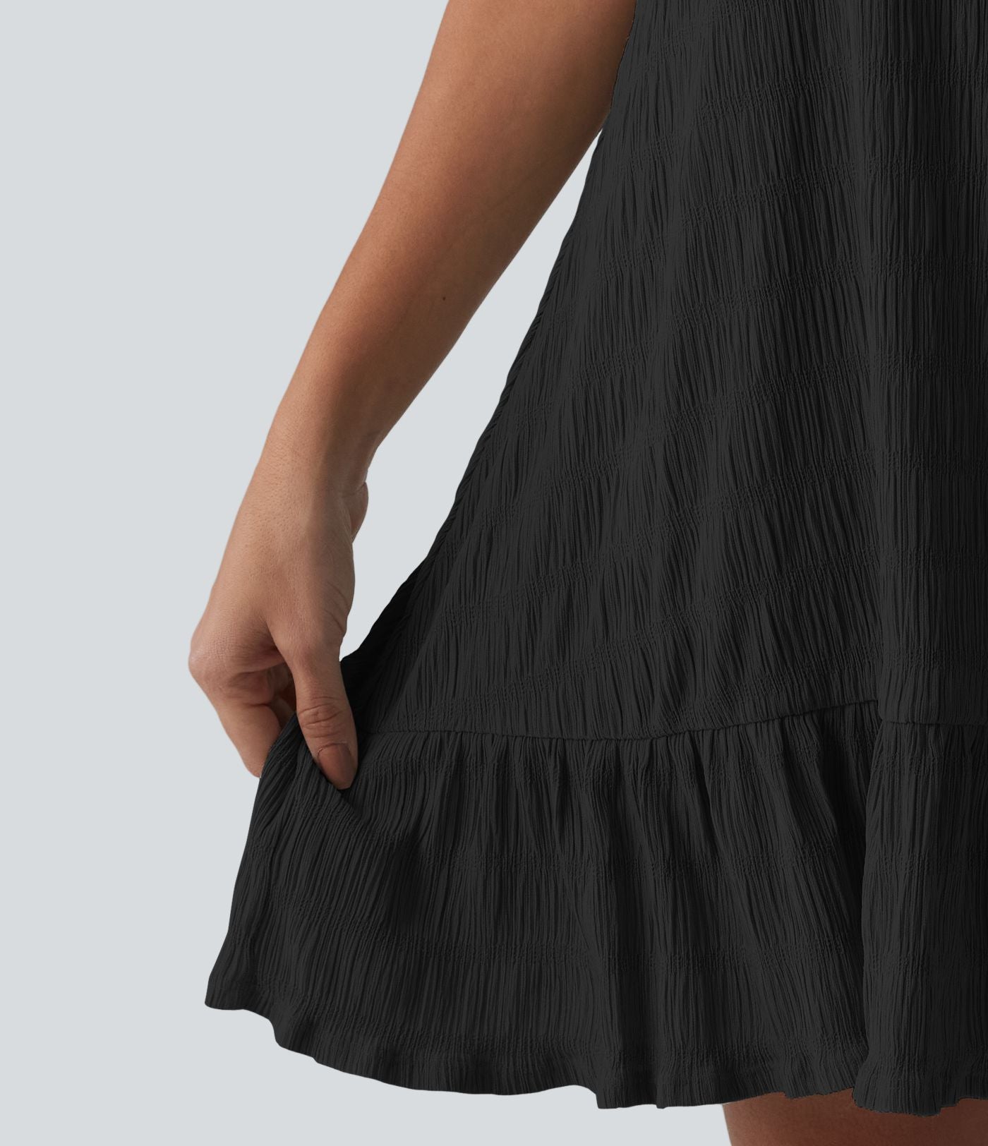 Robe courte décontractée sans manches à col rond, soutien-gorge intégré et ourlet à volants