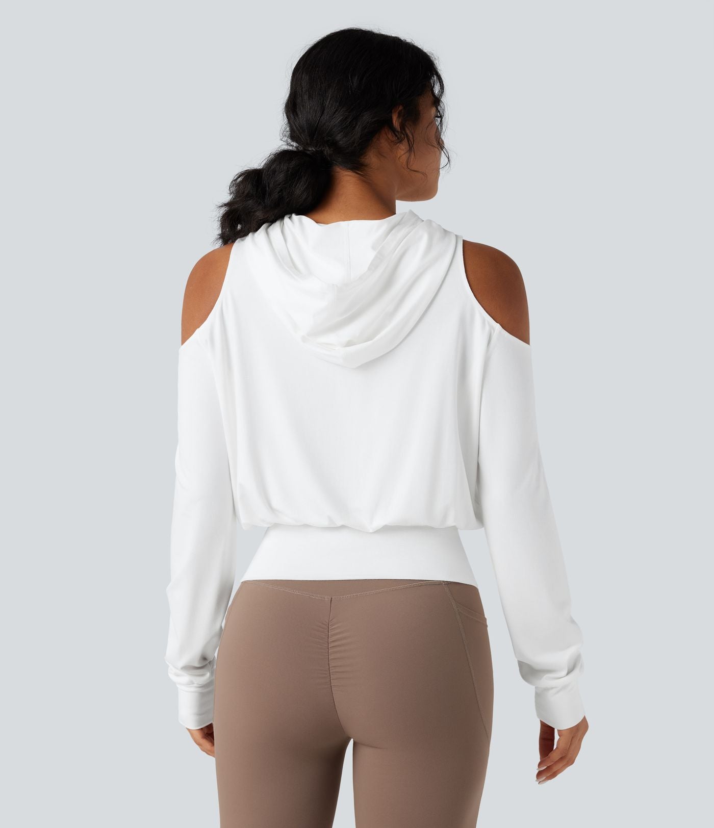 Sweat-shirt de sport à capuche épaules dénudées manches longues