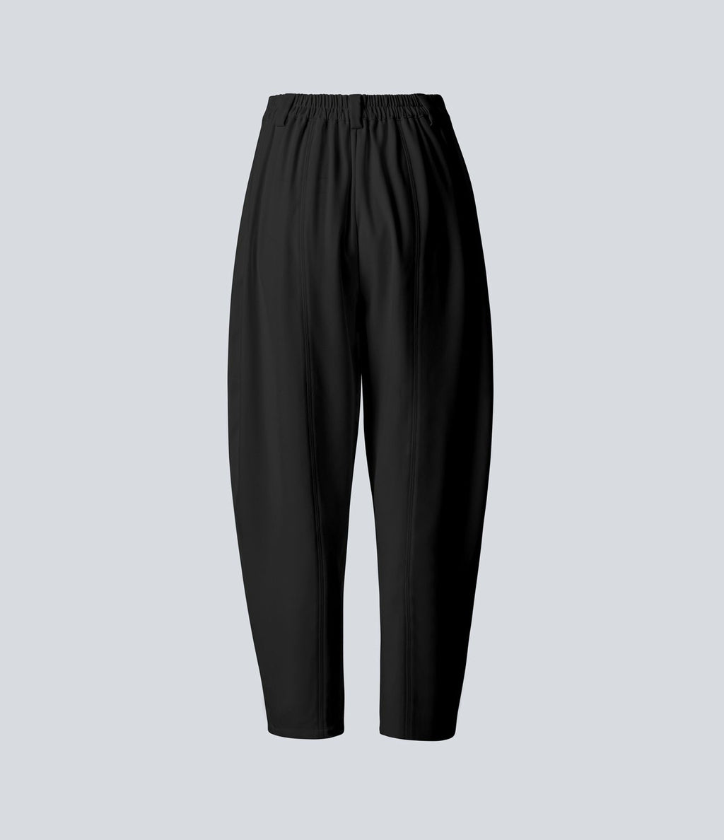 Pantalon tailleur ample, taille moyenne, coupe barrel, à poches