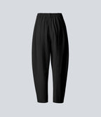Pantalon tailleur ample, taille moyenne, coupe barrel, à poches