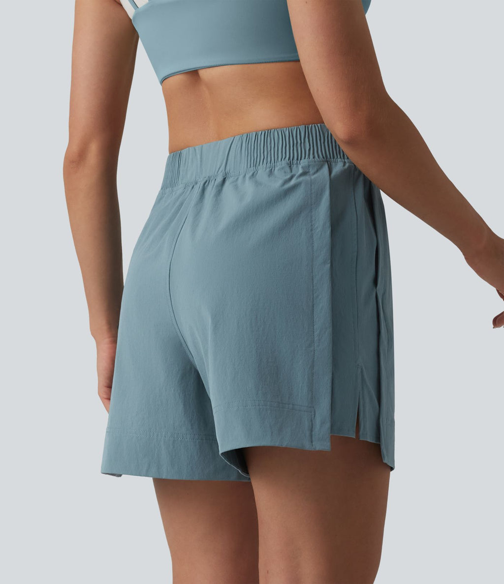 Short de tennis taille haute effet frais InstantCool avec fentes et poches, protection solaire UPF50+