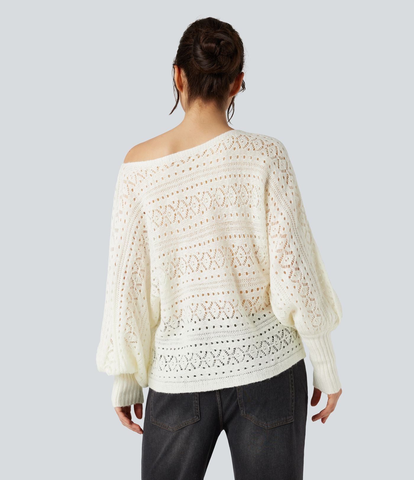 Pull ajouré col rond manches chauve-souris longues
