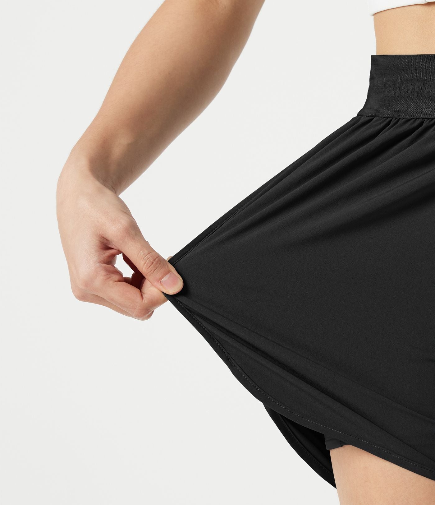 Short de sport 7,5 cm Breezeful™ 2-en-1 séchage rapide taille haute en mesh contrastant à poches