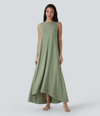 Robe longue décontractée fluide à col rond, sans manches, poches latérales et ourlet asymétrique