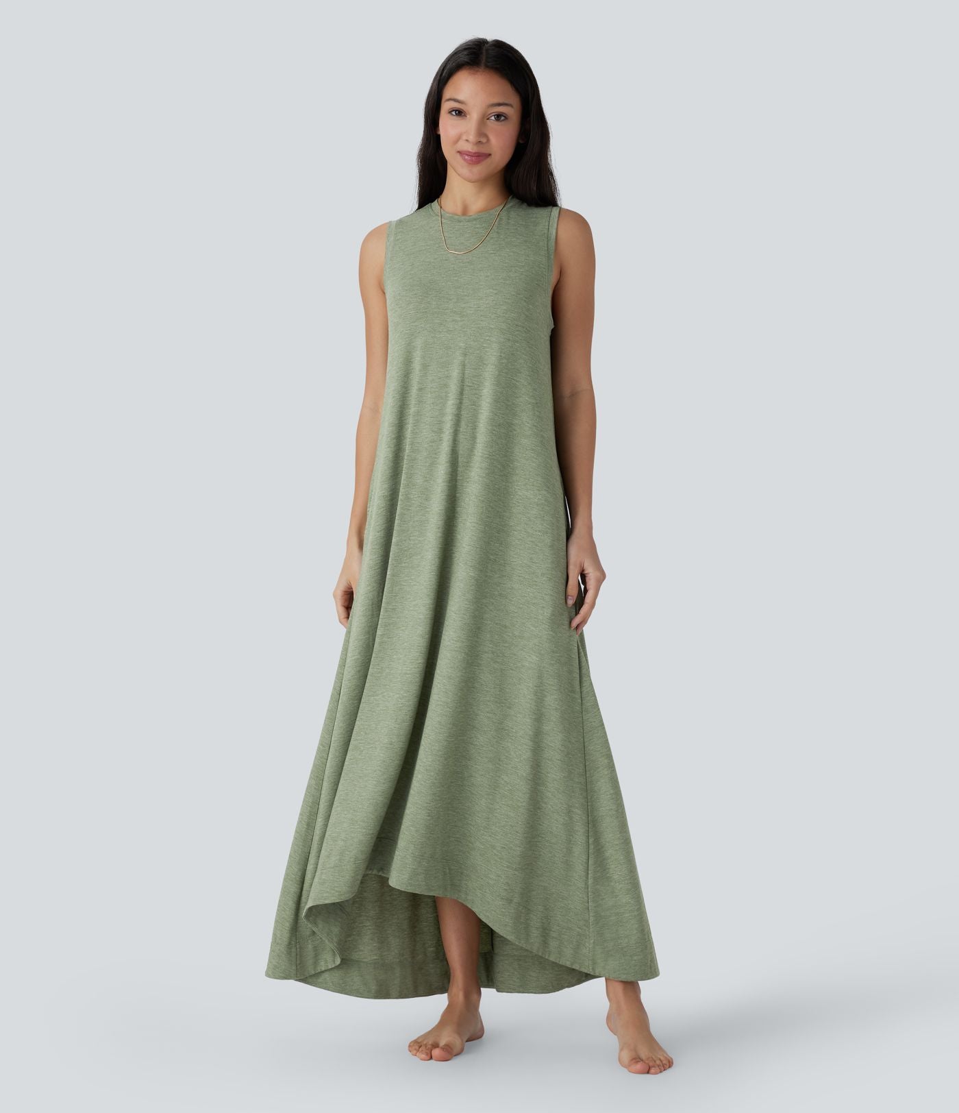 Robe longue décontractée fluide à col rond, sans manches, poches latérales et ourlet asymétrique