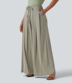 Pantalon large fluide taille mi-haute aspect lin avec ceinture et poches