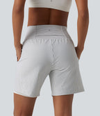 Short yoga 2-en-1 à rayures taille super haute 17,5 cm avec poches