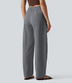 Pantalon tailleur asymétrique effet lin, taille moyenne, coupe ballon, à poches