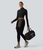 Haut de sport court col cheminée demi-zip manches longues avec passe-pouces