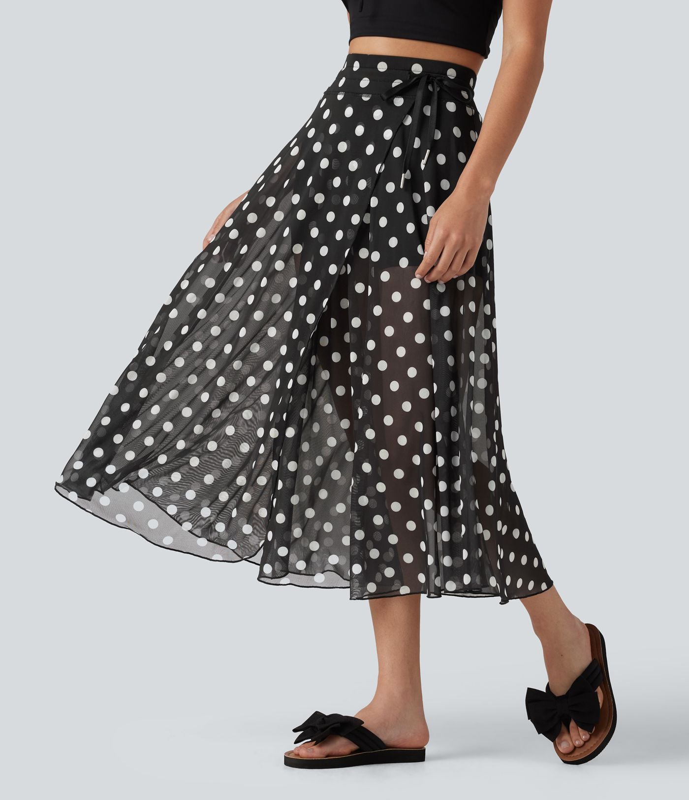Jupe-short midi fluide évasée taille haute style vacances en mesh à pois avec cordon de serrage et poches