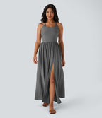 Robe longue fluide fendue avec poches latérales, dos nu et effet torsadé