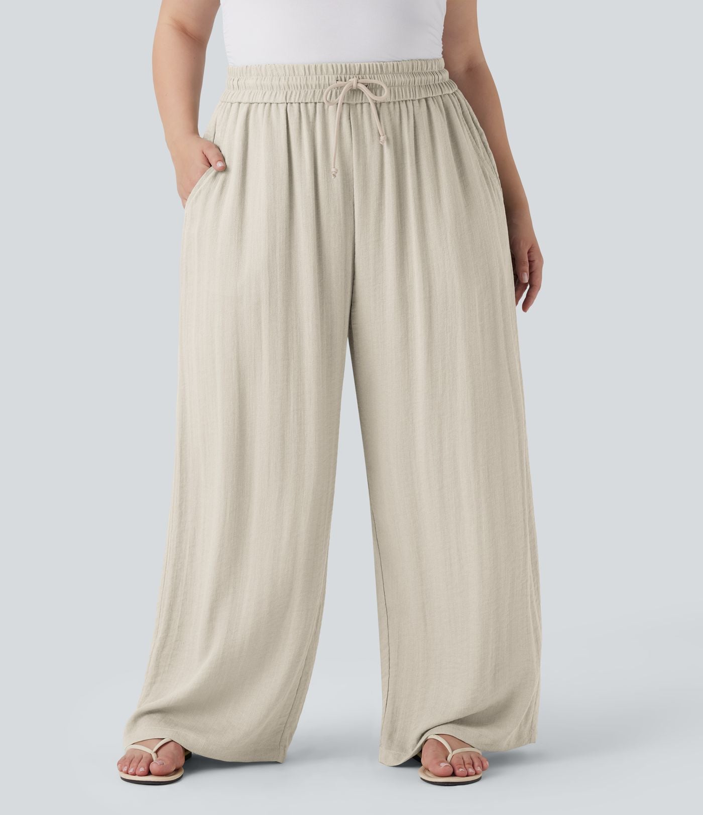 Pantalon décontracté grande taille large fluide taille haute effet lin avec cordon de serrage et poches