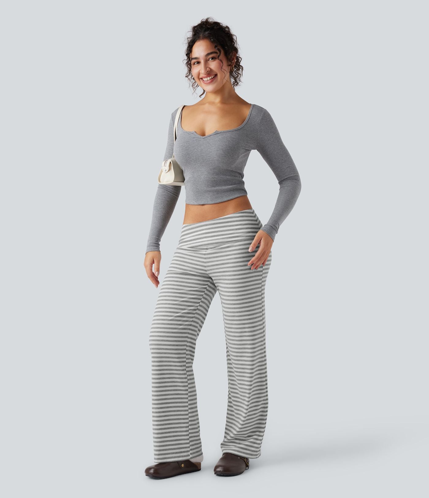 Pantalon évasé rayé taille basse à rabat