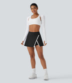 Jupe de tennis mini 2-en-1 à taille haute, fente, blocs de couleur et poche latérale