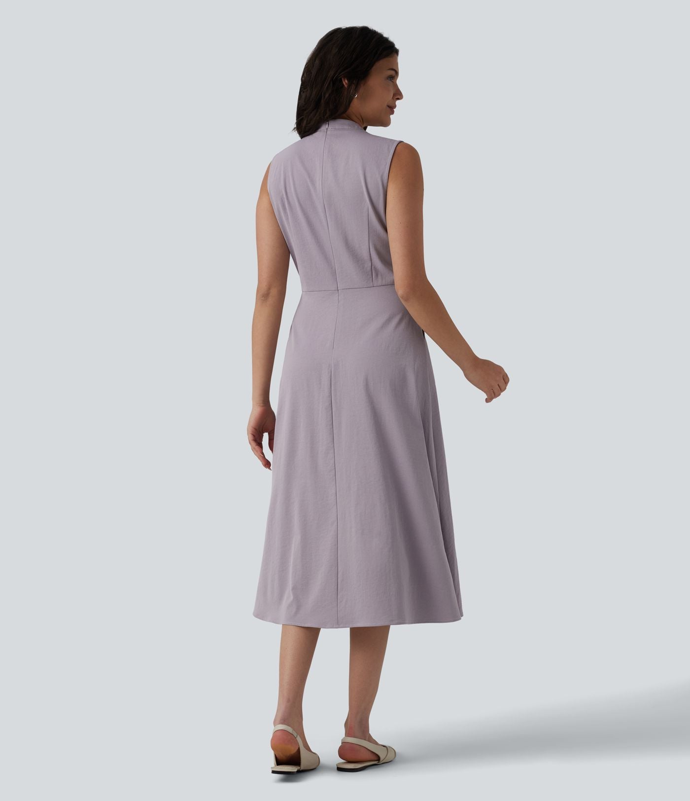 Robe mi-longue plissée col V sans manches avec fermeture éclair invisible et poches pour le travail