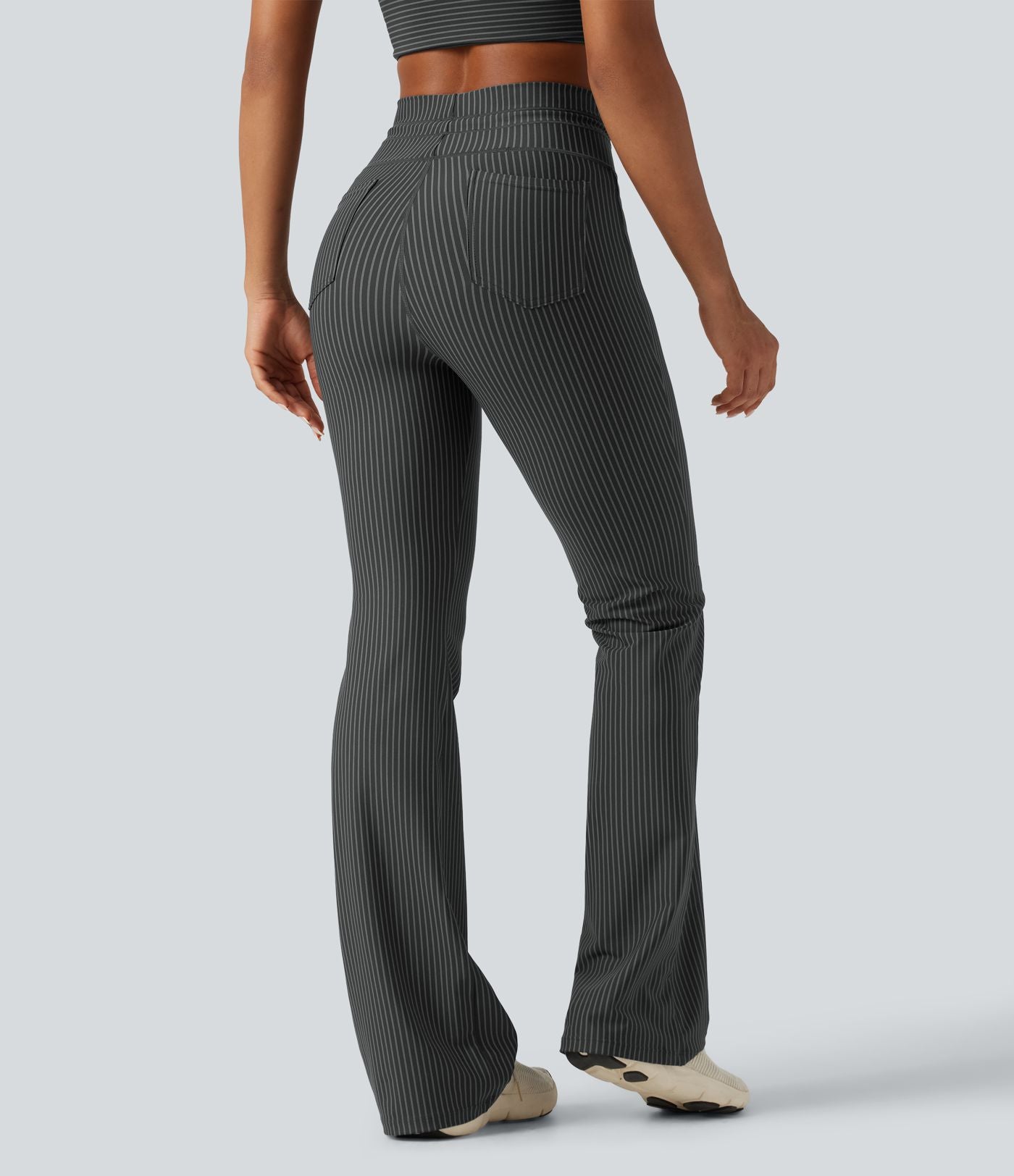Pantalon de yoga flare taille haute rayé avec cordon de serrage et poches