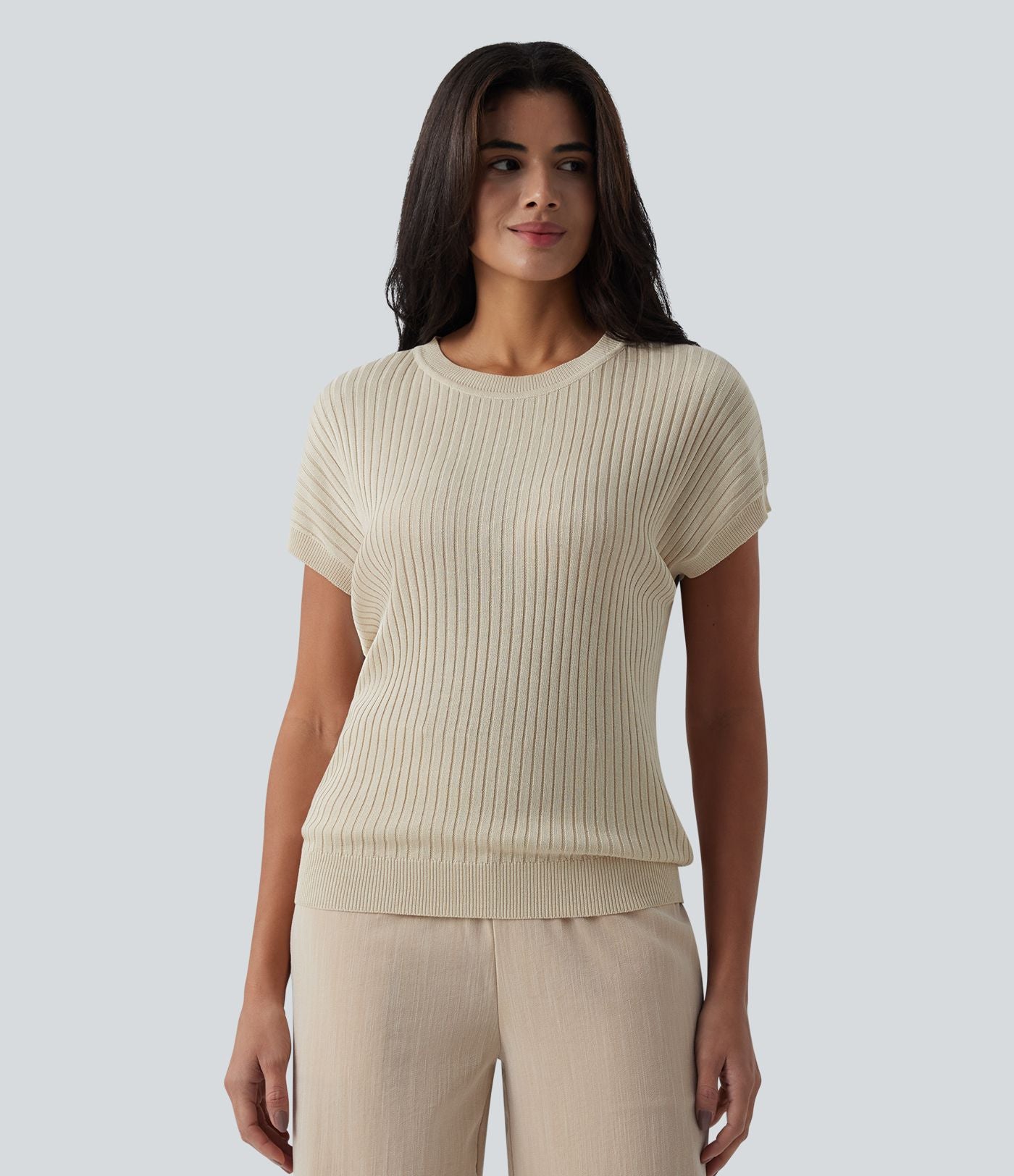 Pull casual col rond manches chauve-souris croisé dos nu