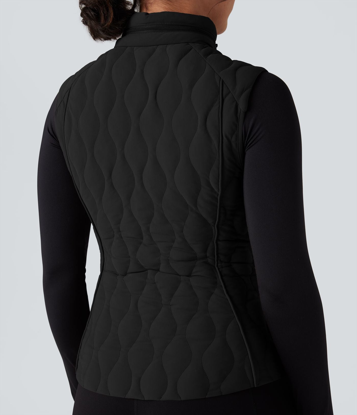 Gilet matelassé running PuffFlex col montant avec zip pliable avec poches