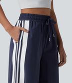 Pantalon large de course taille haute effet frais InstantCool à séchage rapide, color block à rayures avec nœud, cordon de serrage et poches, protection solaire UPF40+