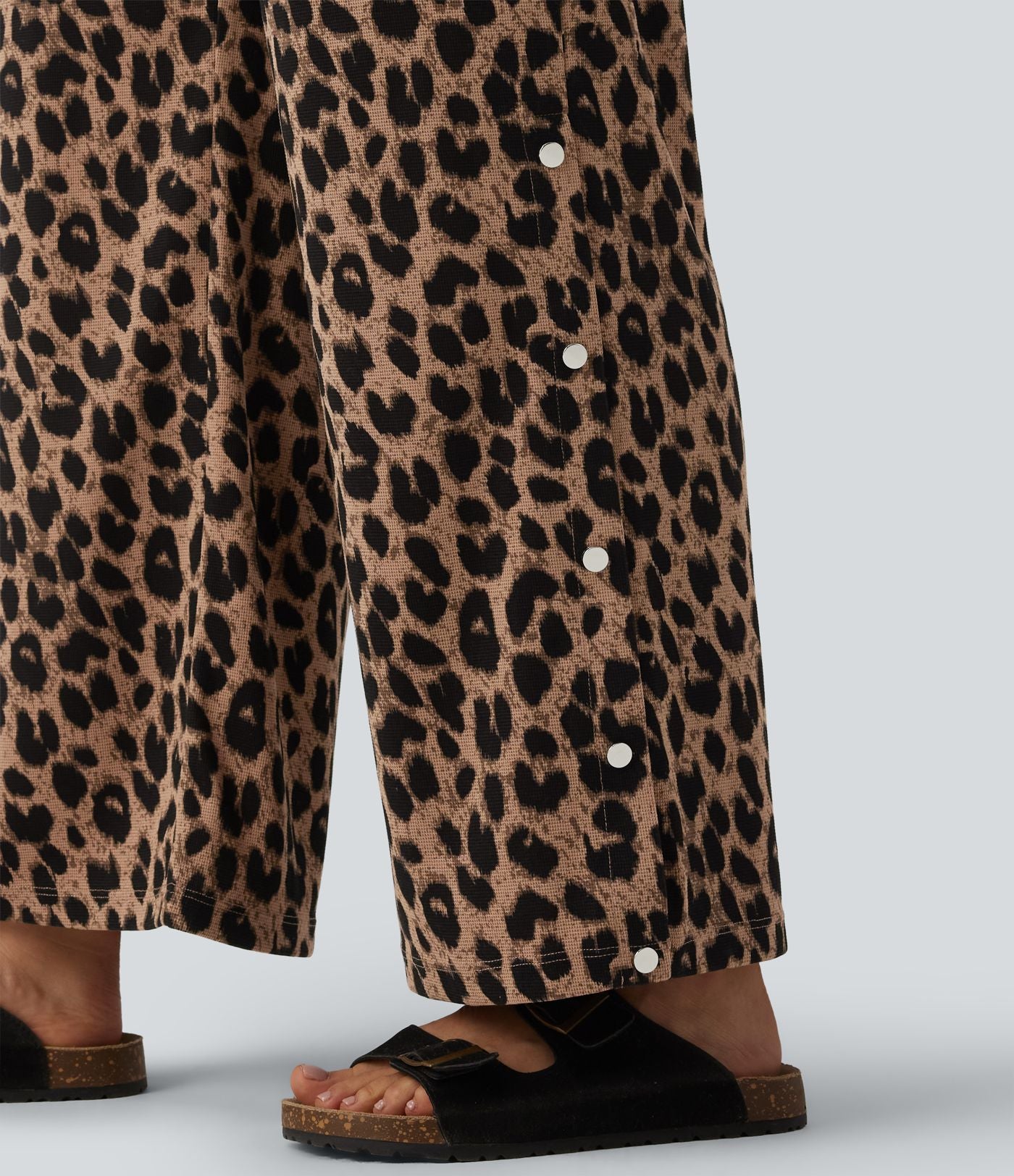 Pantalon large casual en maille gaufrée imprimé léopard taille mi-haute avec cordon de serrage et poches