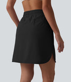 Jupe de sport 2 en 1 SoftlyZero™ Airy, taille mi-haute, ourlet incurvé et cordon de serrage, avec poches