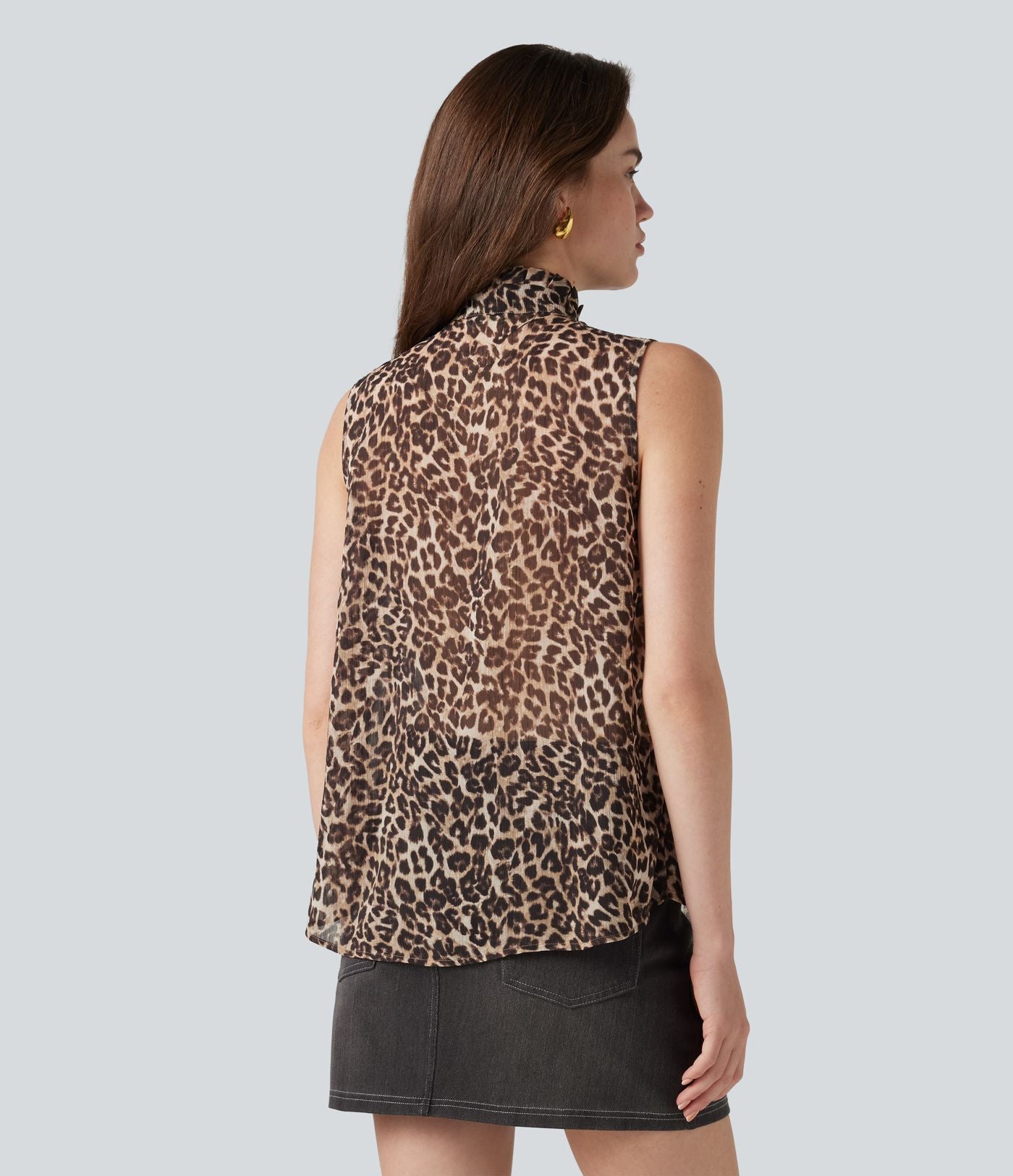 Blouse de travail en mousseline col cheminée avec nœud, sans manches, imprimé léopard